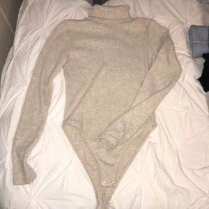 A turtleneck body suit!!